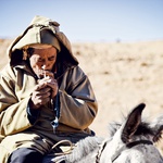 Maroški nomad na oslu.  (foto: Klemen Razinger)