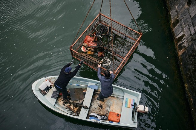 FOTO: Potapljači očistili Ljubljanico in iz nje potegnili marsikaj