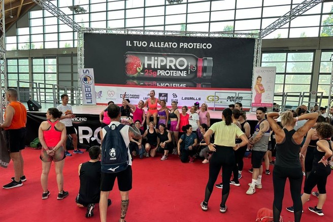 Kdo je Slovenka, ki so jo pod odrom največjega sejma športa in wellnessa v Evropi nestrpno čakali, da odvodi treninge?