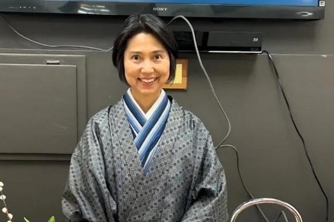 Ženska v tradicionalni japonski opravi.