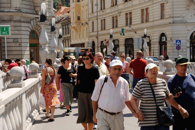 Ljubljana turisti Tromostovje